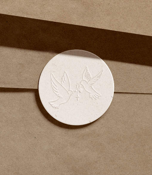 Embossed Faithfully Found dove and cross seal on an envelope