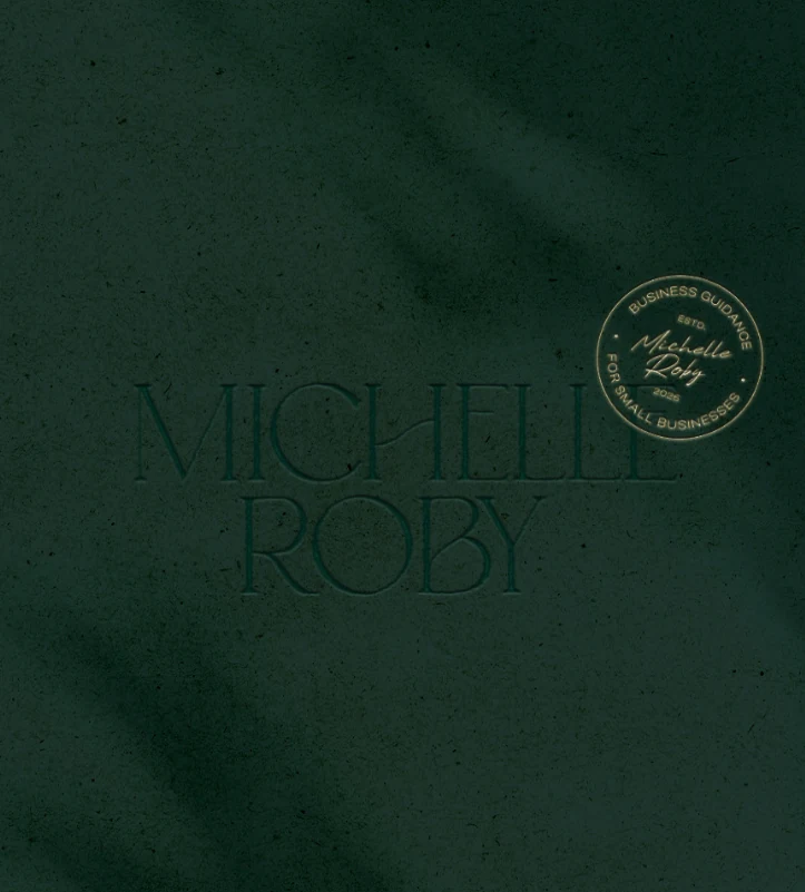 Michelle Roby’s embossed green wordmark and gold business guidance seal