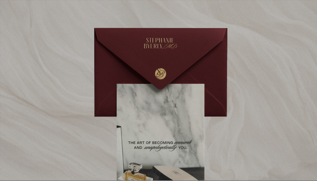 Stephanie Byerly’s burgundy envelope with gold lettering and marble-patterned stationery